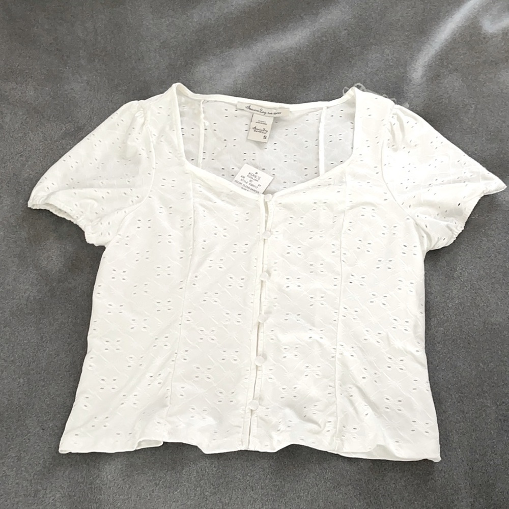 white puff sleeve button front top
